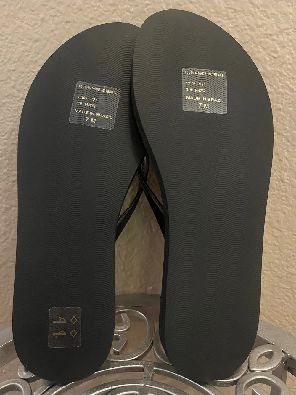 Tory Burch Black Quilted Flip Flops with Gold Logo Accent